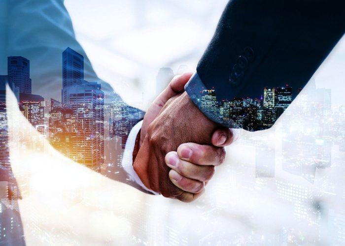 handshake, business deal, city-6701408.jpg